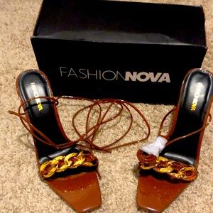 Brand new high heel shoes from Fashion Nova. Size 9 brown shoe.